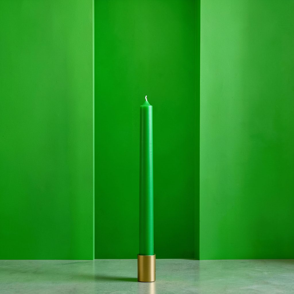 A tall decorative two-pronged candle holder styled among garden containers, in muted greens and earthy tones